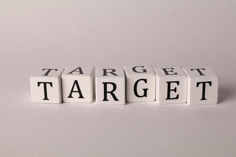 Six white blocks arranged in a row, each with a black letter, together spelling the word "TARGET" against a plain background.